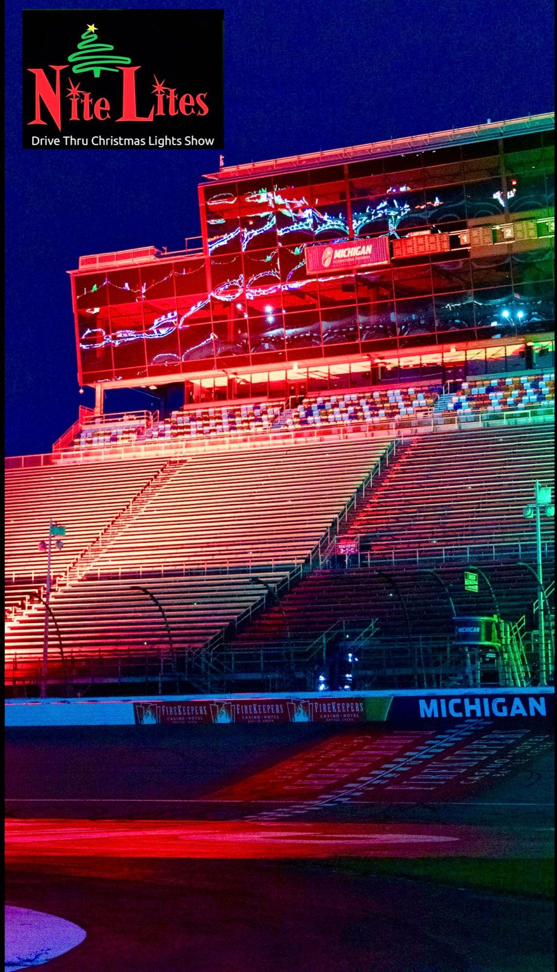 Michigan International Speedway grandstand lit up at night