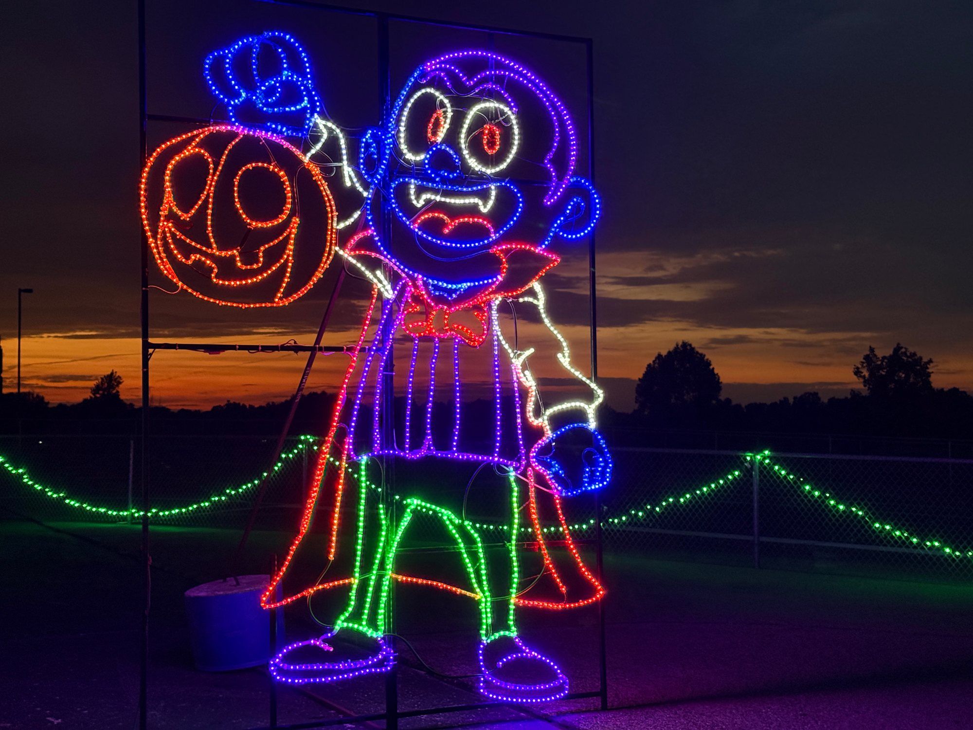 Vampire and pumpkin light display on the Halloween route
